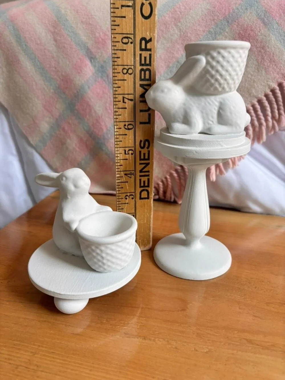 Set of Thrift flip ceramic Easter Bunny egg holders on pedestals